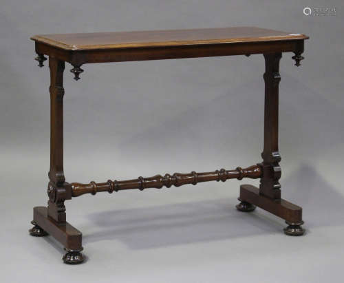 A Victorian mahogany centre table, raised on shaped supports...