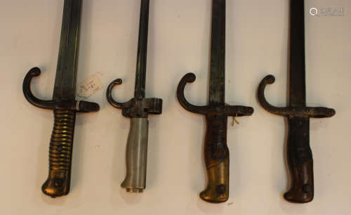 A group of four late 19th century bayonets, comprising an 18...
