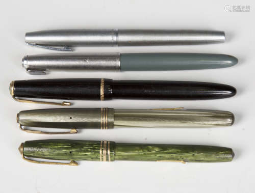 A group of five fountain pens, including Parker and Conway S...