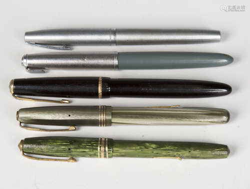 A group of five fountain pens, including Parker and Conway S...