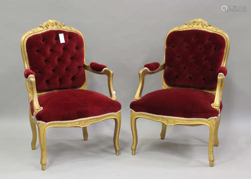 A pair of 20th century Louis XV style gilt painted showframe...
