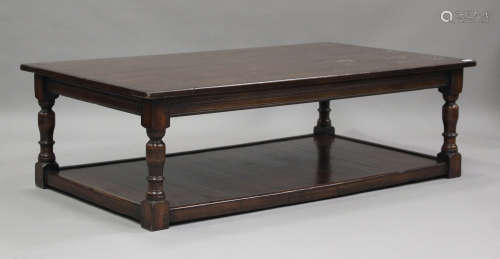 A modern oak two-tier coffee table, possibly by By-Law, on t...