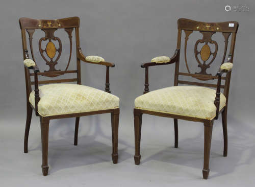 A pair of Edwardian walnut salon armchairs with inlaid decor...