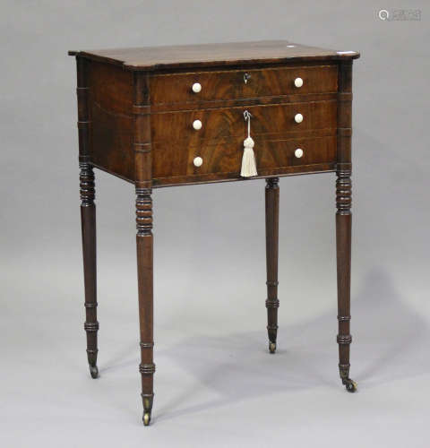 A George IV figured mahogany side table with projecting corn...