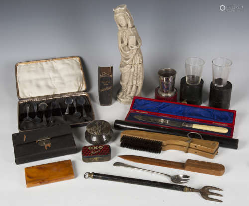 A small group of collectors' items, including a cast composi...