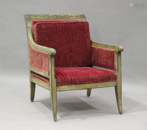 A 19th century Swedish green painted scroll armchair with fo...