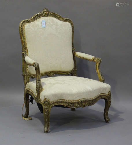 A 19th century French giltwood showframe fauteuil armchair w...