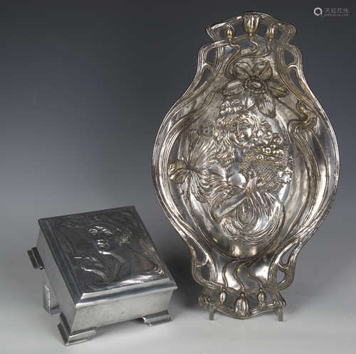 An Art Nouveau cast metal musical cigarette box, the interio...