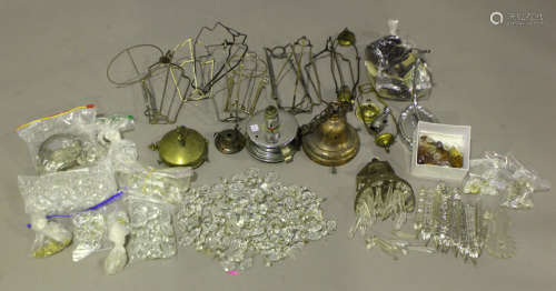 A selection of cut glass light fitting drops, together with ...