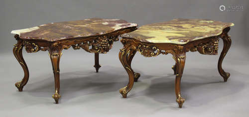 A pair of late 20th century rococo style gilt painted coffee...