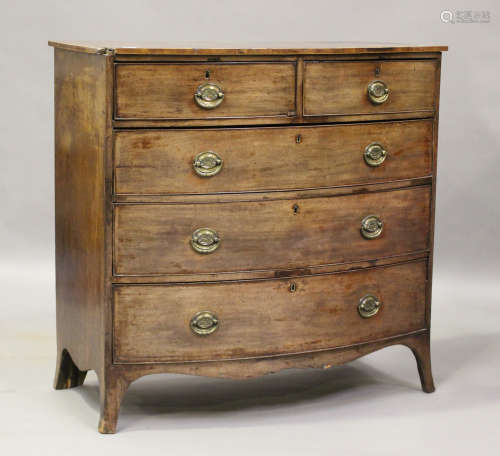A George III mahogany bowfront chest, fitted with two short ...