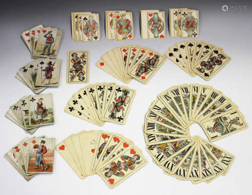 A small group of playing cards, comprising a pack of 53 taro...