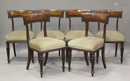 A set of six William IV mahogany bar back dining chairs with...