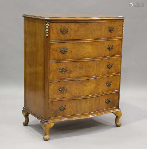 A mid-20th century Queen Anne style walnut chest of five dra...
