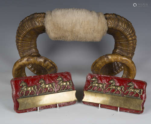 A pair of 19th century brass and red leather horse blinkers,...