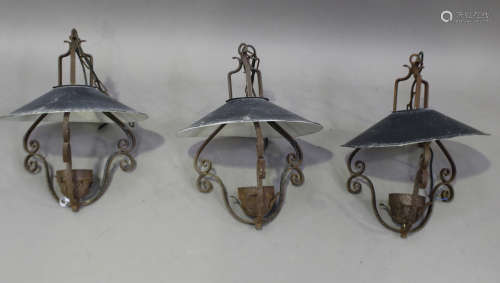 A set of three early 20th century wrought iron ceiling light...