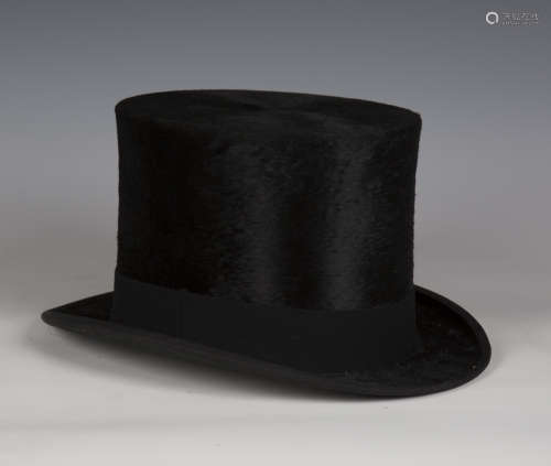 An early 20th century black moleskin top hat by Tress & Co L...