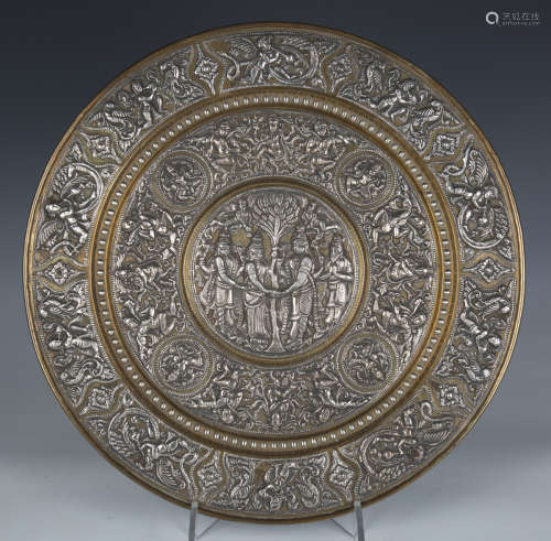 A 19th century Indian white metal mounted brass circular dis...
