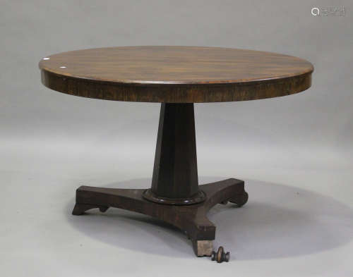 A Regency rosewood circular tip-top centre table, raised on ...
