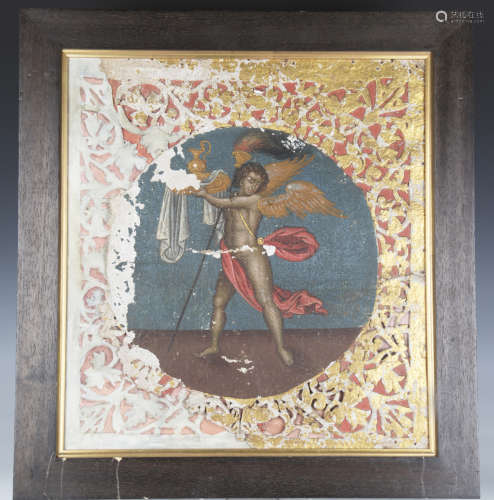 An Italian painted and gilded card panel of an angel holding...