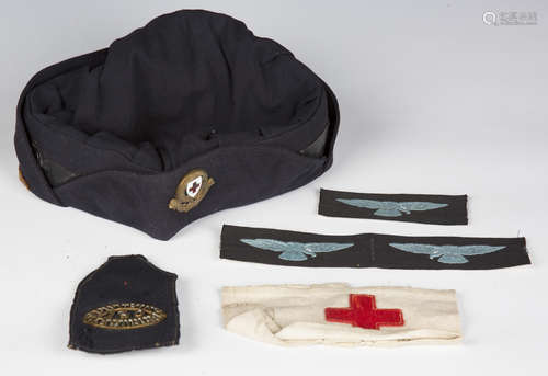 A set of R.A.F. Mk VII flying goggles, an R.A.F. field cap, ...