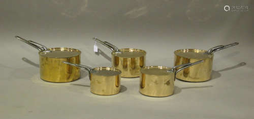 A set of five Victorian copper saucepans by Benham & Froud, ...