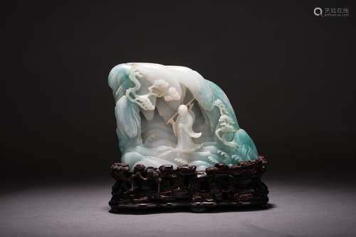 A JADEITE CARVED 'BODHIDHARMA CROSSING RIVER' BOULDER