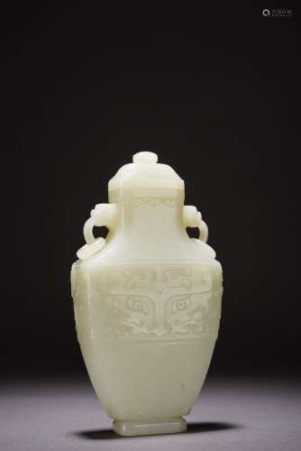 A CHINESE WHITE JADE 'TAOTIE' VASE