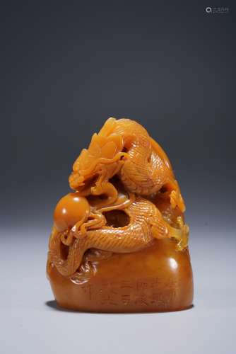 A CHINESE YELLOW SOAPSTONE SEAL