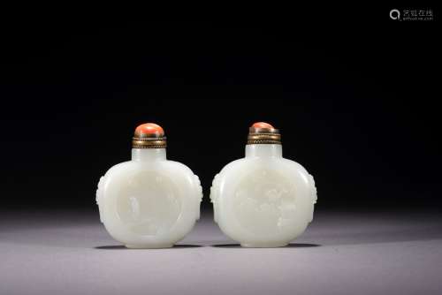 A PAIR OF CHINESE WHITE JADE CARVED SNUFF BOTTLES