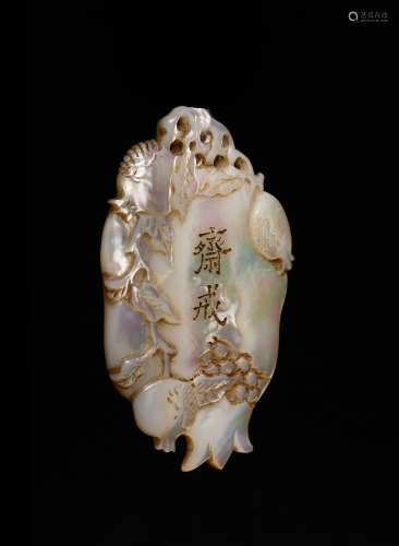 A CHINESE MOTHER-OF-PEARL 'ABSTINENCE' PENDANT