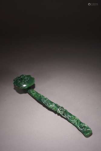 A CHINESE SPINACH GREEN JADE RUYI SCEPTER