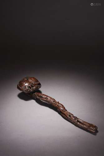 AN AGARWOOD CARVED 'PEACH AND BAMBOO' RUYI SCEPTER