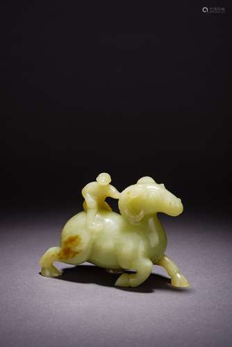 A YELLOW JADE 'BOY AND RAM' CARVING