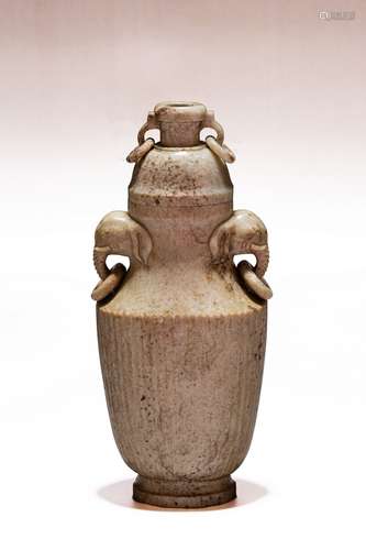 A CHINESE CALCIFIED JADE VASE AND COVER