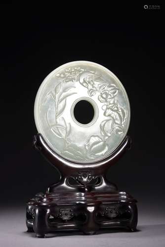 A WHITE JADE CIRCULAR 'BIRD' INSCRIBED DISC FORM TABLE SCREE...