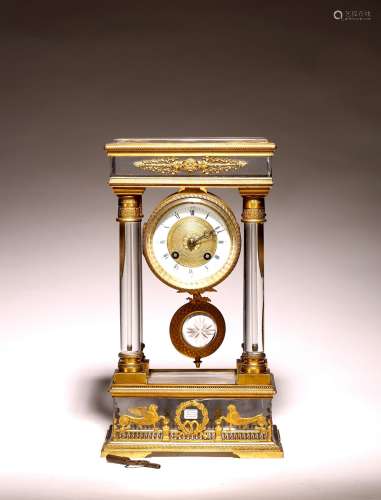 A FRENCH ORMOLU BRONZE AND CRYSTAL MANTLE CLOCK