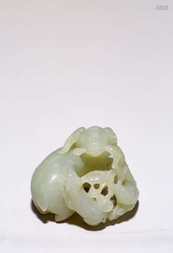 A CHINESE CELADON JADE 'THREE RAMS' CARVING