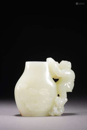 A CHINESE WHITE JADE 'BOY' WATER POT