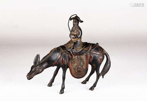 A CHINESE PARCIL GILT 'LAOZI RIDING DONKEY' CENSER