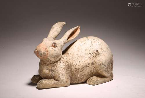 A CHINESE PAINTED POTTERY FIGURE OF RABBIT