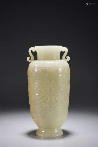 A CHINESE WHITE JADE 'TAOTIE' VASE