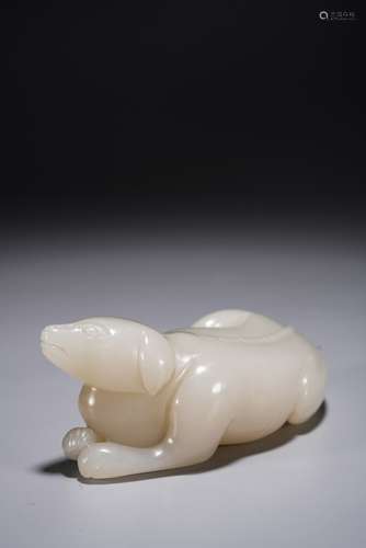 A CHINESE WHITE JADE CARVING OF RECUMBENT DOG