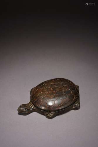 A CHINESE OPAQUE BLACK 'TURTLE' INKSTONE