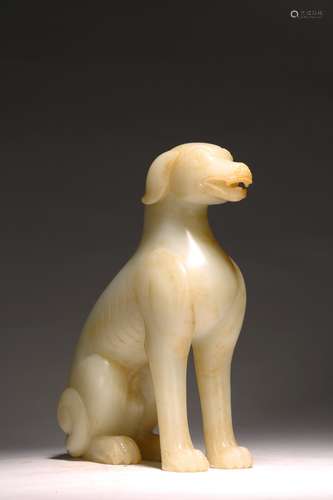 A CHINESE WHITE JADE CARVED FIGURE OF DOG