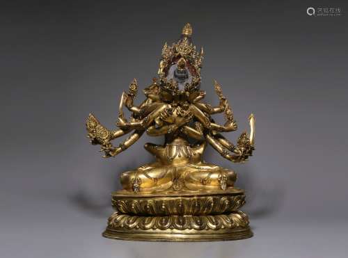 A LARGE GILT BRONZE FIGURE OF GUHYASAMAJA