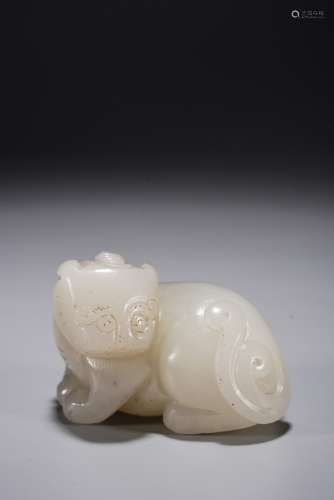 A CHINESE WHITE JADE MYTHICAL BEAST PAPER WEIGHT