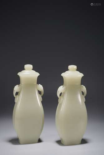 A PAIR OF CHINESE WHITE JADE VASES AND COVERS