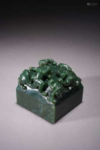 A CHINESE SPINACH GREEN JADE SQUARE SEAL