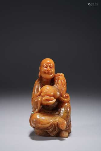 A CHINESE SOAPSTONE CARVING OF LUOHAN FIGURE